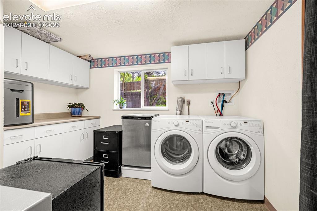 Image 17 of 32: Laundry and Utility area has plenty of room for a chest freezer, additional