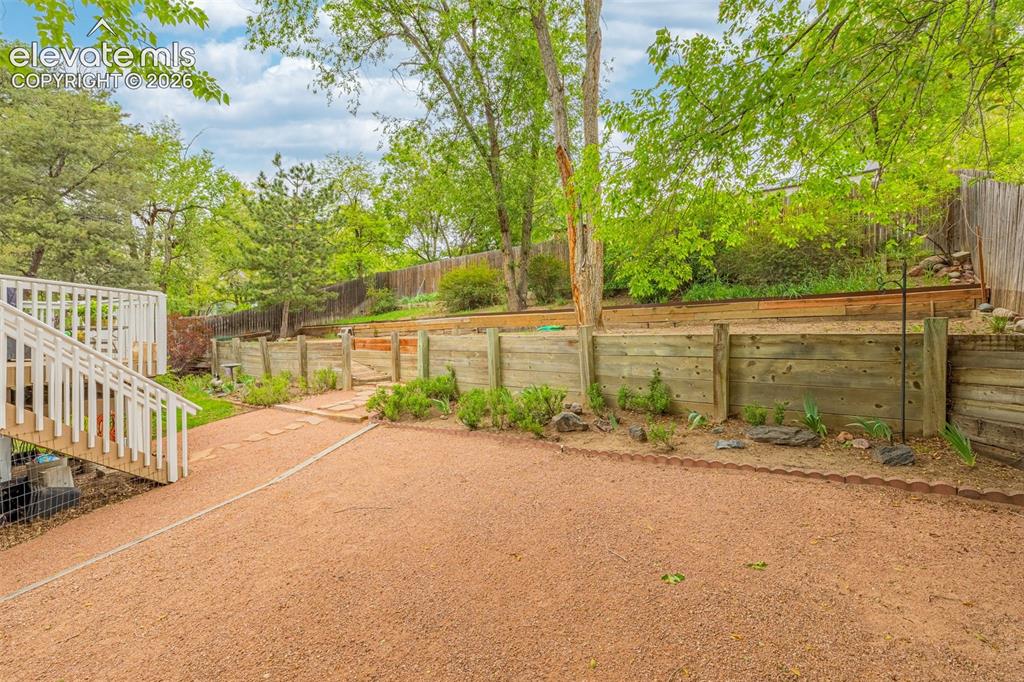 Image 24 of 32: Gravled level area makes it easy to install a shed, pool or play area.  
