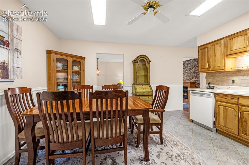 Image 4 of 32: Another view of the spacious kitchen with pass throughs to the living room 