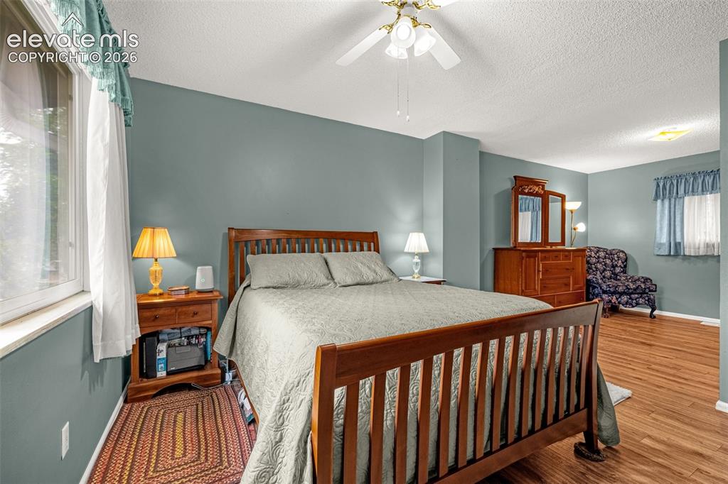 Image 7 of 32: Bright and expansive Primary bedroom is located on the upper level and near