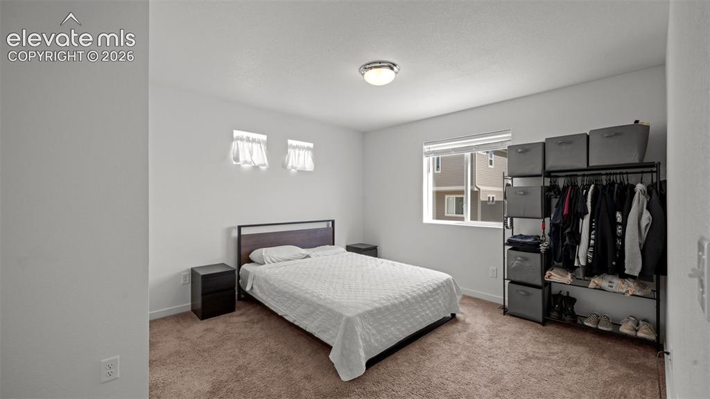 Image 14 of 34: Master Bedroom