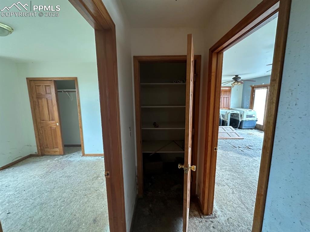 Image 22 of 36: Hallway featuring carpet flooring and baseboards