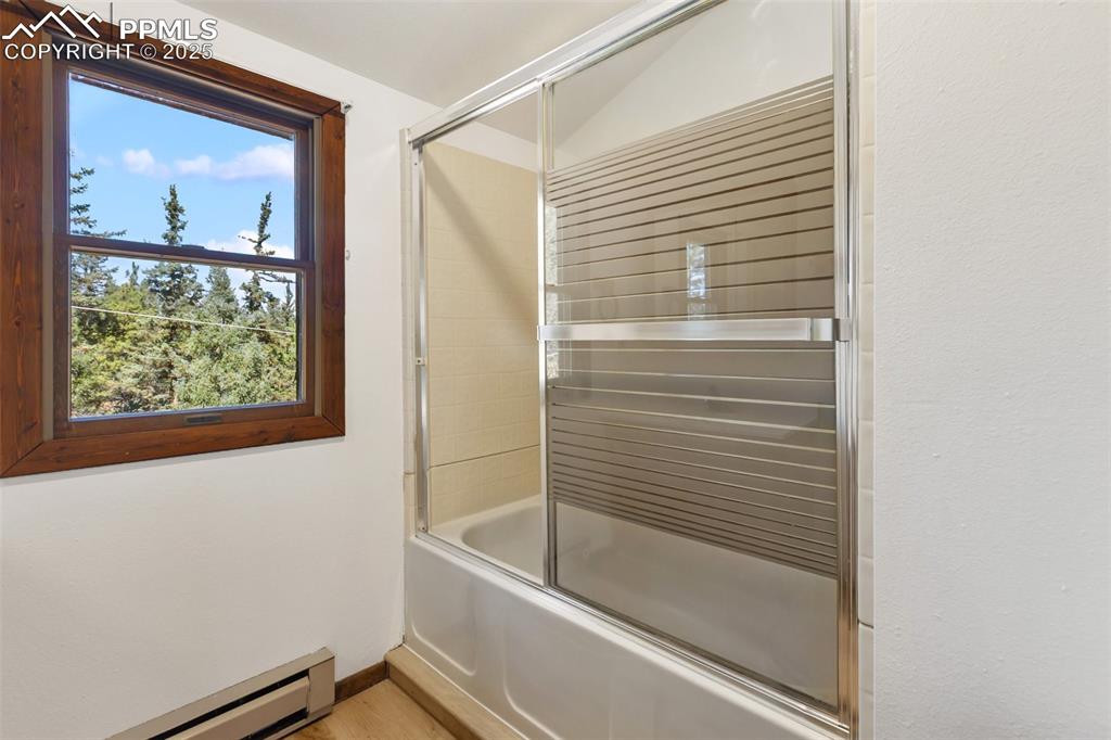 Image 37 of 50: Upper level full bathroom with all new paint and LVT