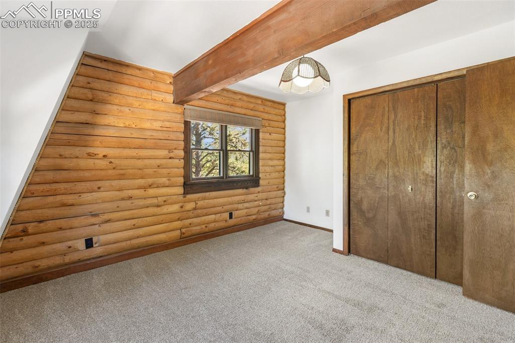 Image 39 of 50: Upper level second bedroom with large closet