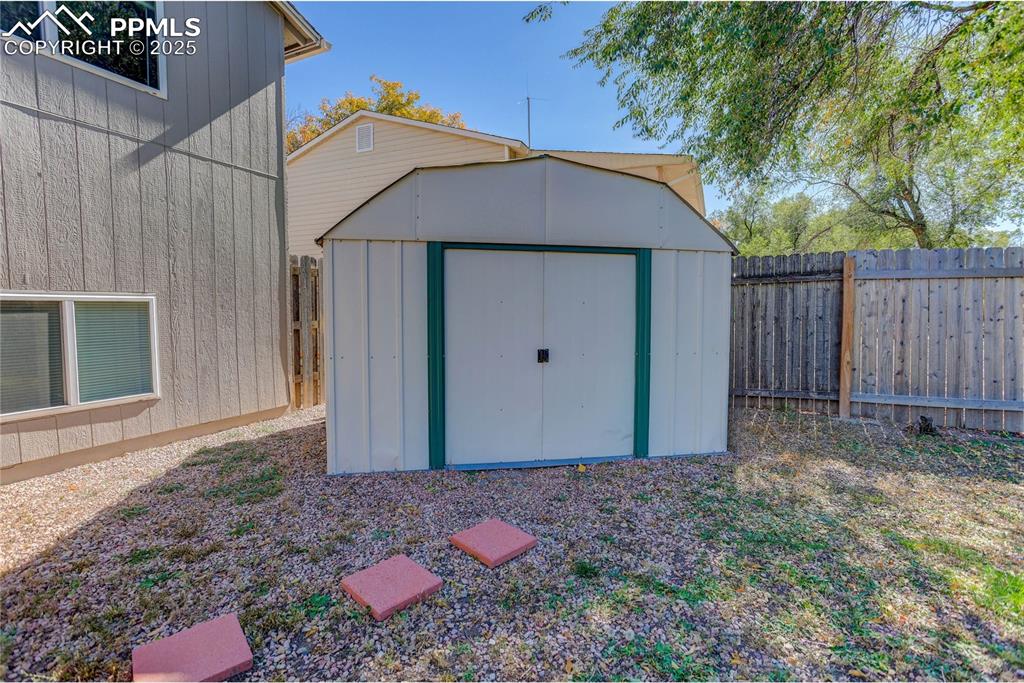 Image 20 of 21: Storage shed