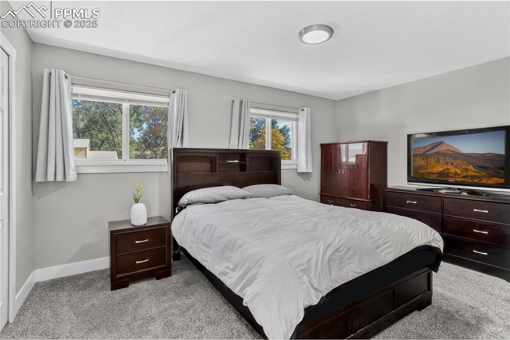 Image 8 of 21: Primary bedroom - upper level