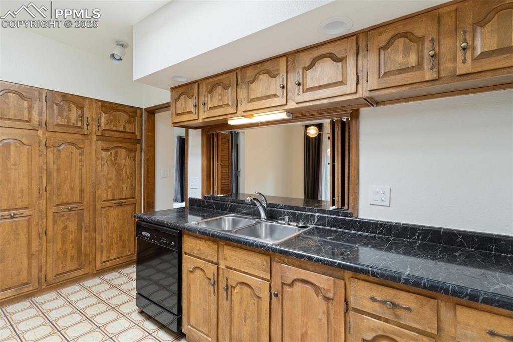 Image 11 of 23: Ample storage and see through to the dining  room