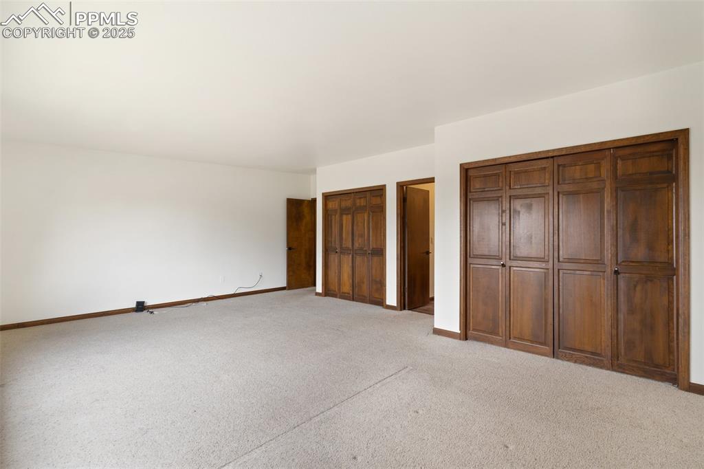 Image 16 of 23: Loads of closet space in primary bedroom