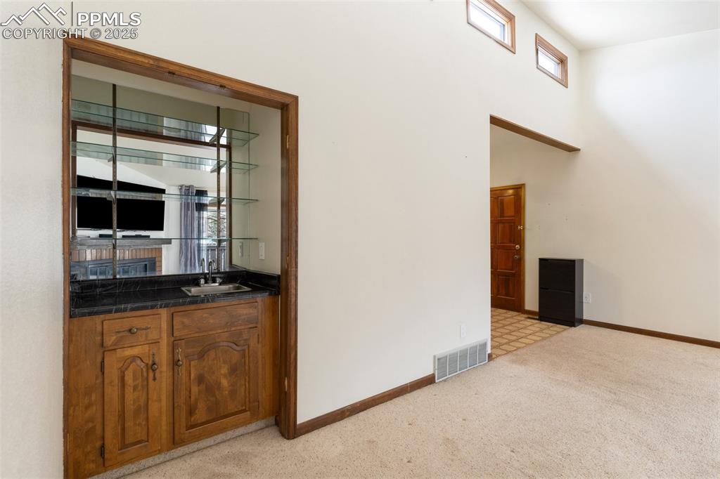 Image 9 of 23: walk up wet bar