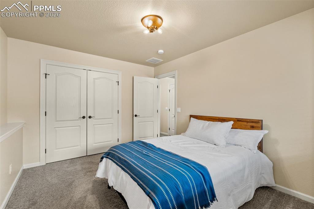 Image 33 of 48: Bedroom