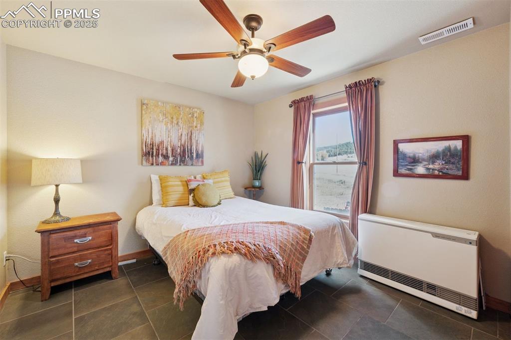 Image 11 of 49: Bedroom