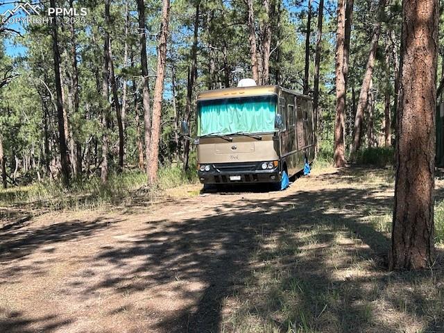 Image 42 of 43: Parking for large RV and
additional vehicles on east end of property