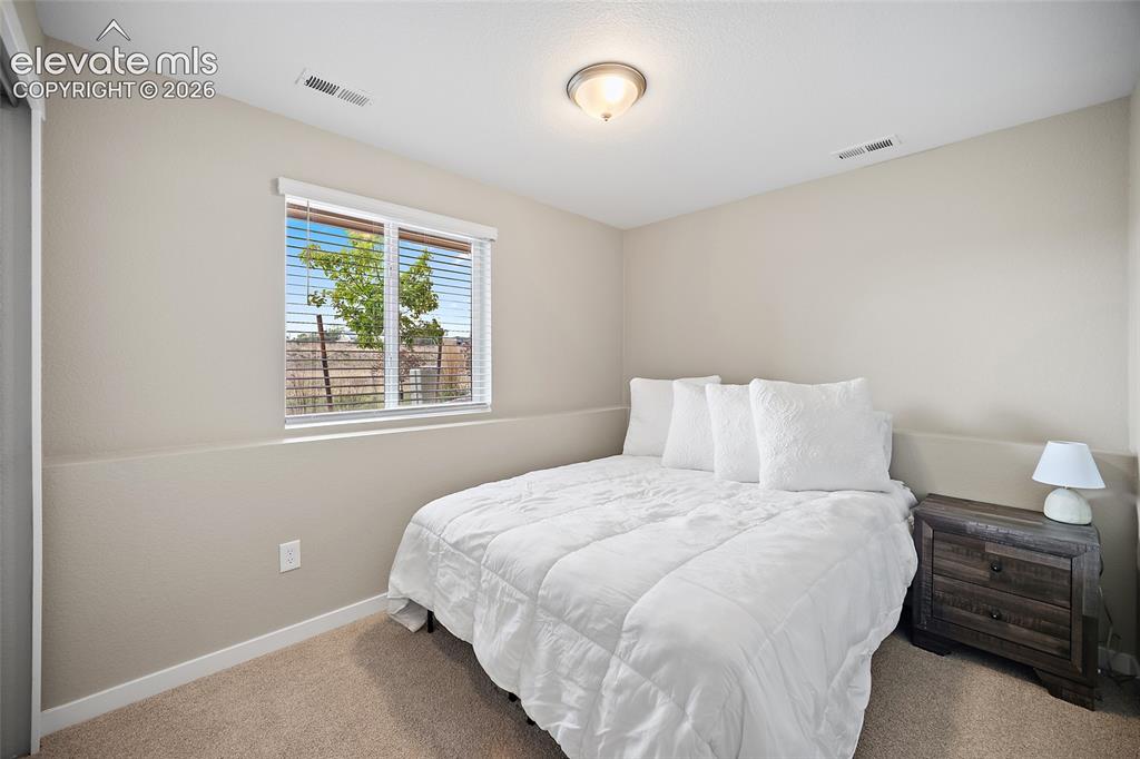 Image 8 of 48: Bedroom