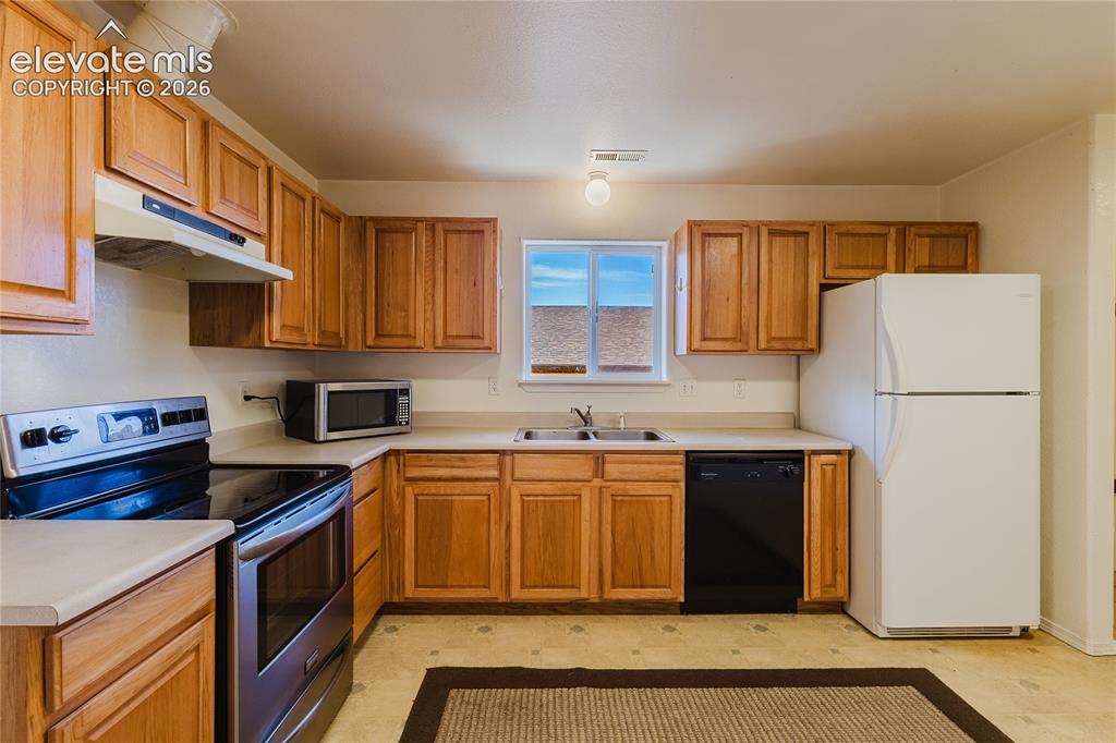 Image 14 of 27: Room to add a small dining area in kitchen