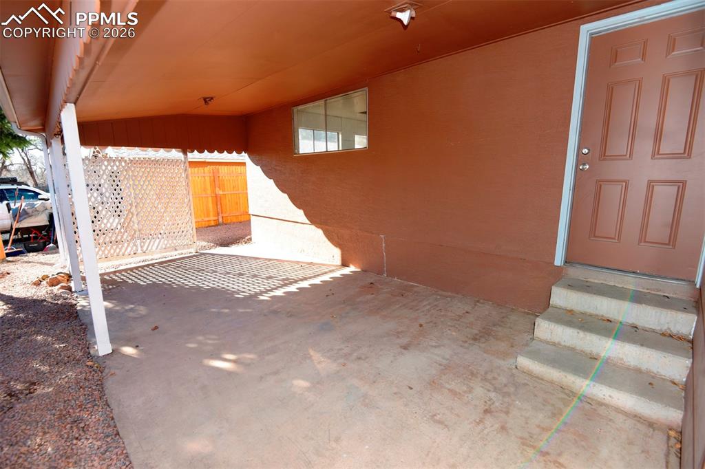 Image 17 of 23: Back Entry to garage