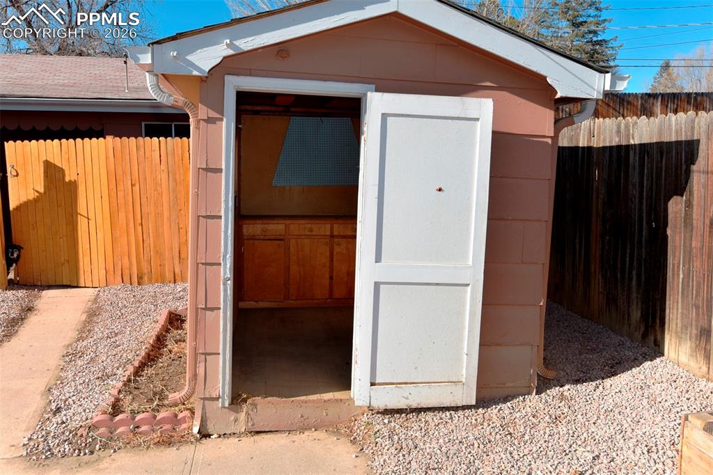 Image 23 of 23: storage shed