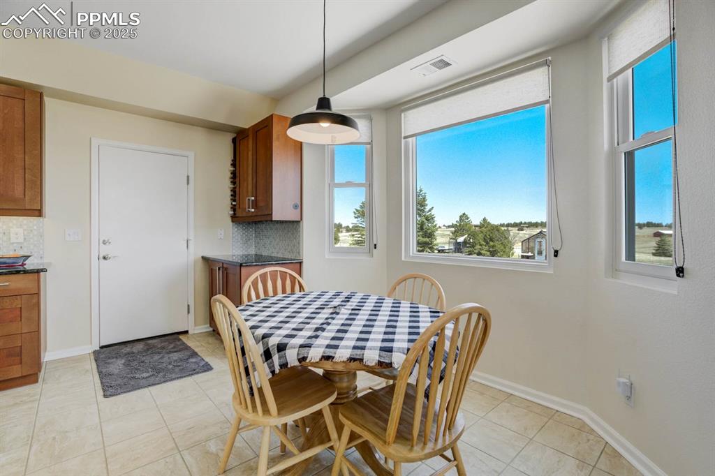 Image 10 of 50: Additional dining space in the kitchen