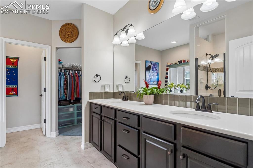 Image 20 of 48: Bedroom featuring crown molding, recessed lighting, a ceiling fan, light co