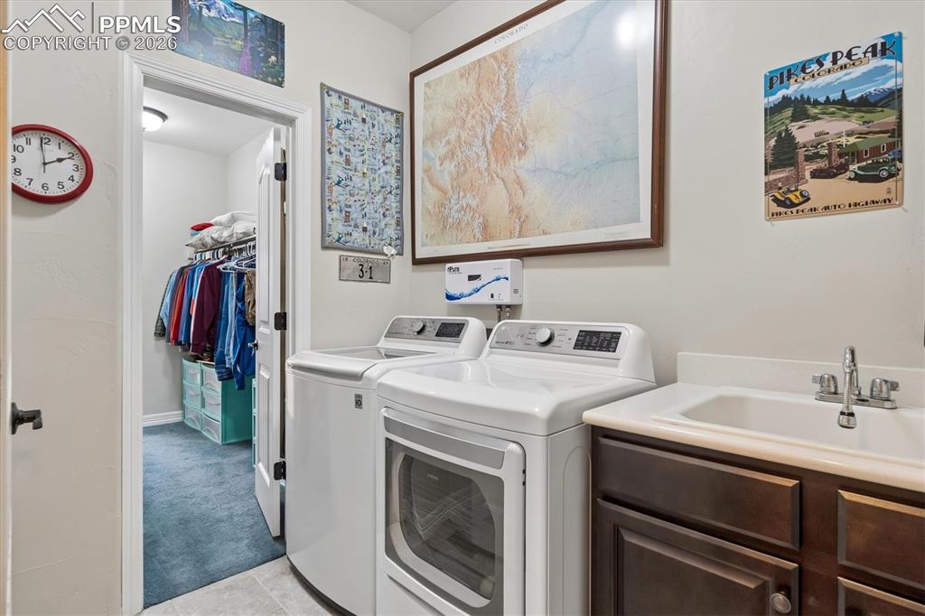 Image 22 of 48: Full bath featuring a stall shower, ensuite bath, a bath, light carpet, and