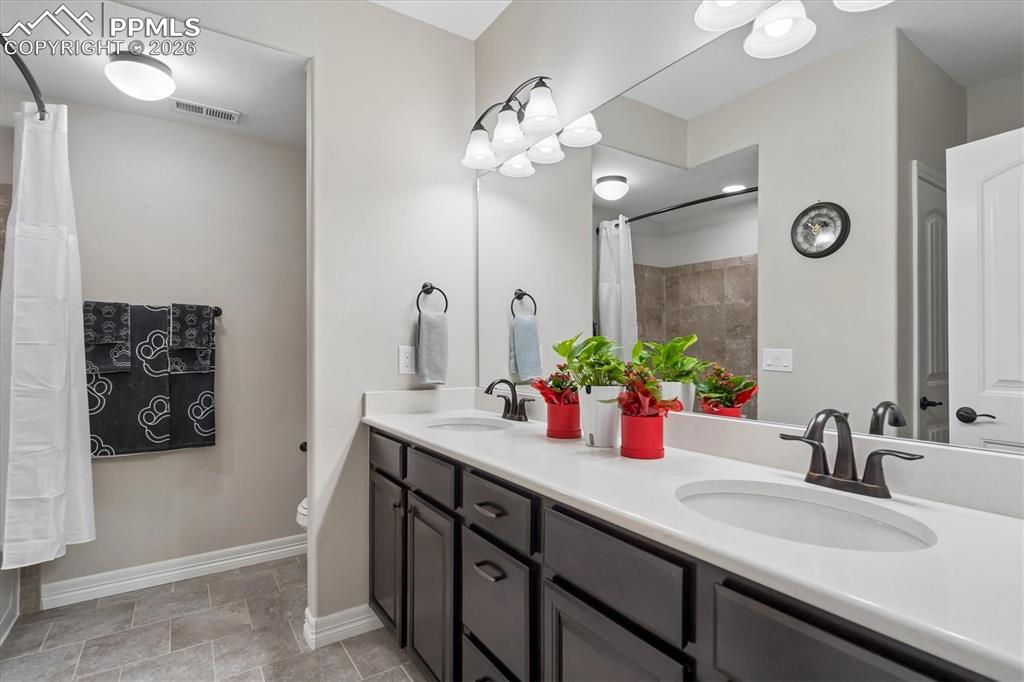 Image 40 of 48: Office space featuring baseboards and light wood-type flooring
