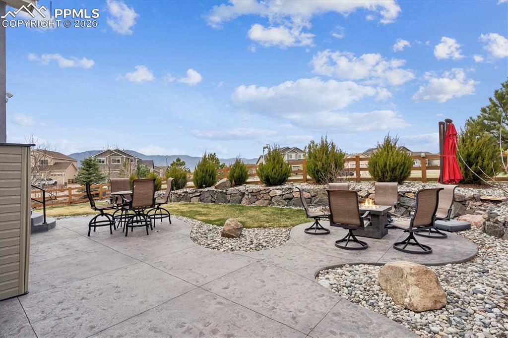 Image 42 of 48: Workout room featuring light carpet