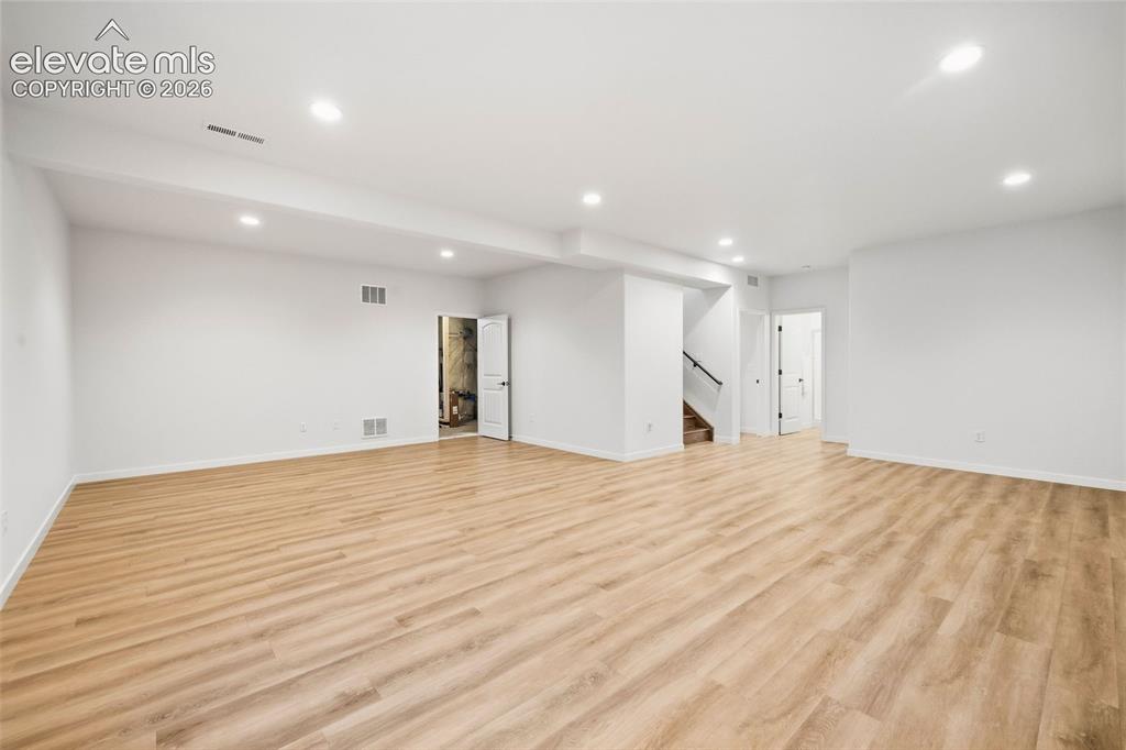 Image 27 of 46: Many basement family rooms are dark and choppy and you can