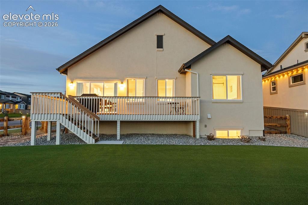 Image 36 of 46: This home is so pretty, inside and out. Artificial turf in the back and rea