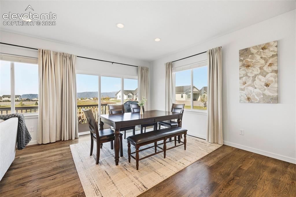 Image 9 of 46: Never miss a sunset. This dining area overlooks the Front Range and has sli