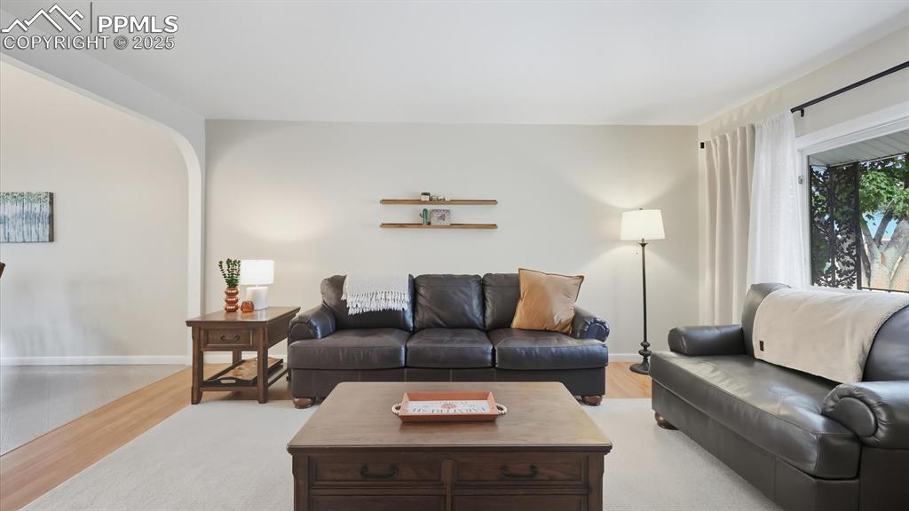 Image 11 of 34: The Living Room flows easily into the Dining Room, great for entertaining f