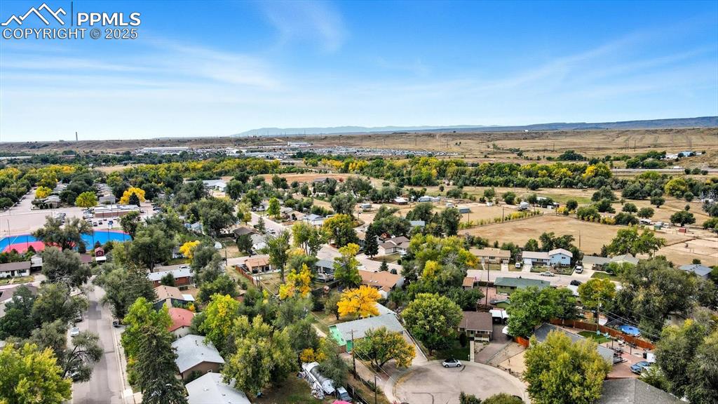 Image 3 of 34: Aerial view of home and cul-de-sac.