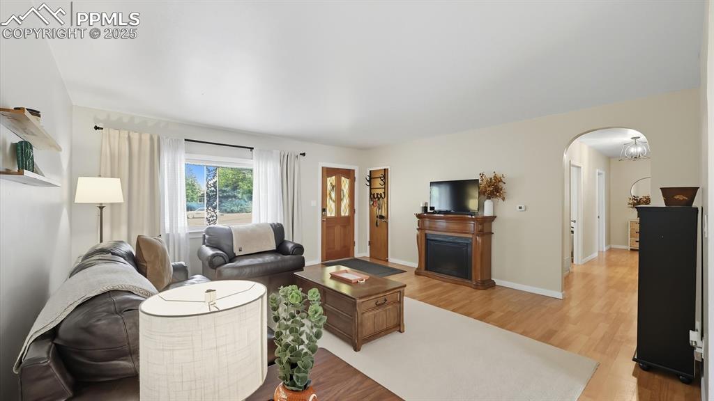 Image 8 of 34: The Front Entry has a coat closet and leads into the Living Room.