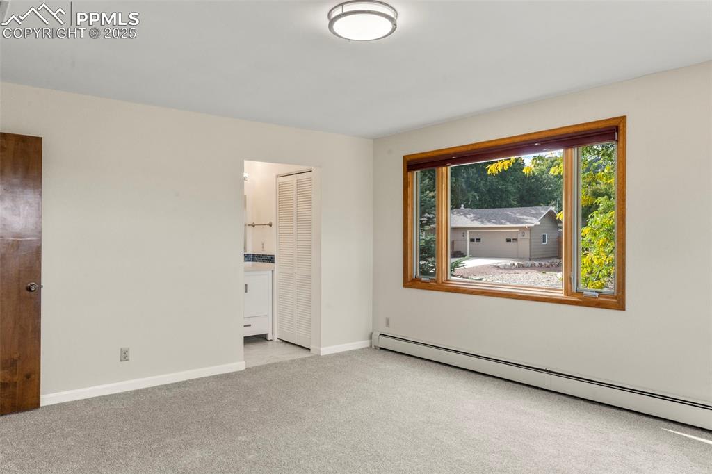Image 12 of 26: Huge, Owner’s Suite Bedroom