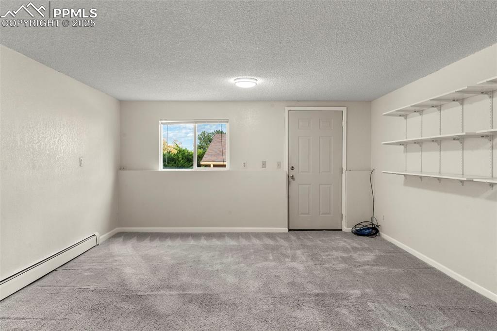 Image 19 of 26: Lower Level Family Room