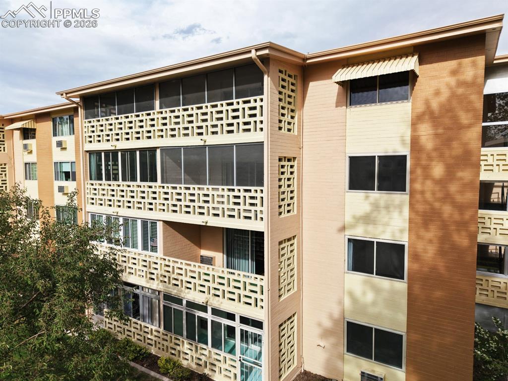 Image 1 of 42: The home is on the 3rd floor and is screened in with included roller blinds