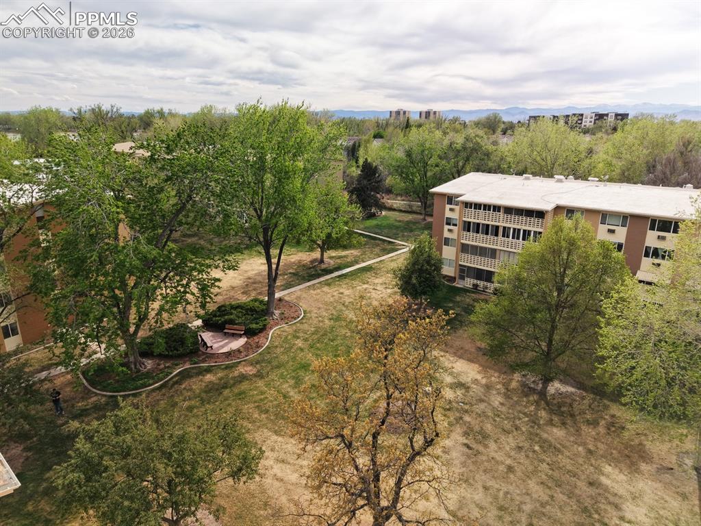 Image 24 of 42: The courtyard on the back of the home faces West and is great for relaxing,