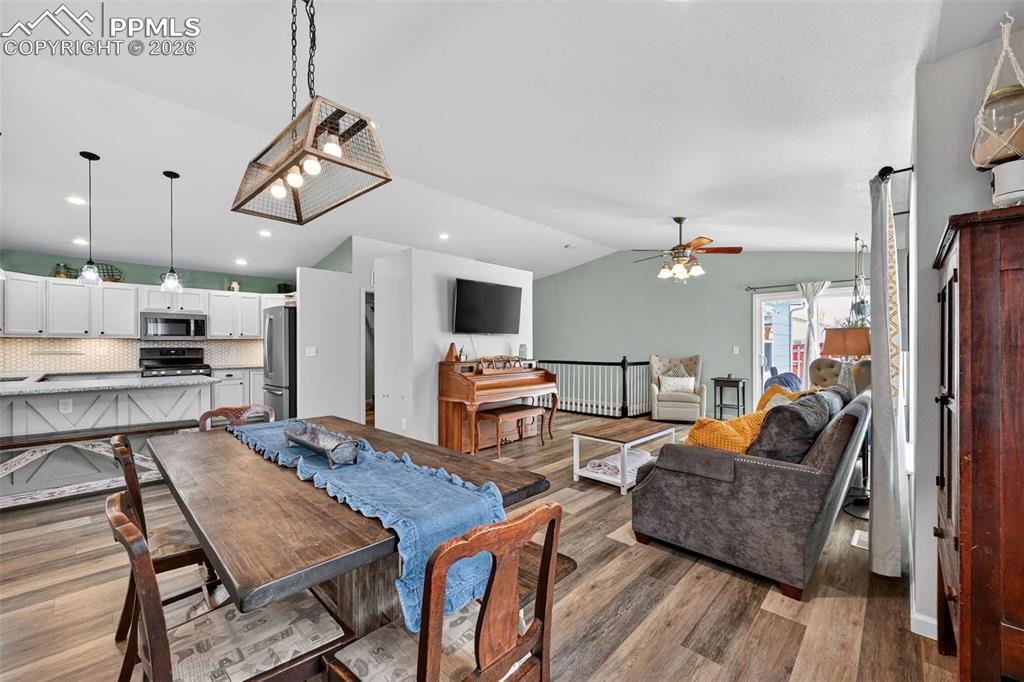 Image 15 of 47: Dining area featuring light wood-style floors, and ceiling fan