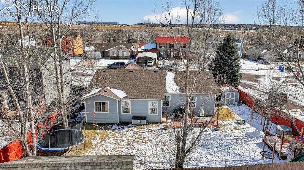 Image 44 of 47: Snowy aerial view featuring a residential view