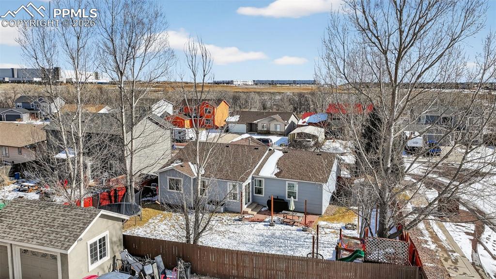Image 46 of 47: Snowy aerial view featuring a residential view