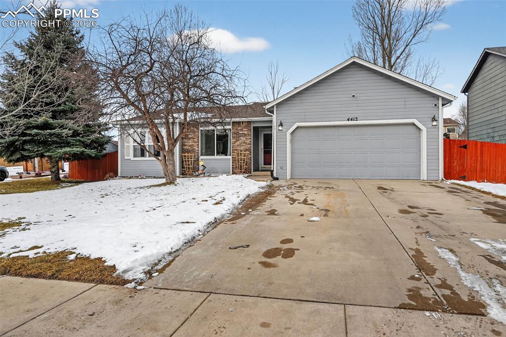Image 7 of 47: Ranch-style home featuring driveway, a garage