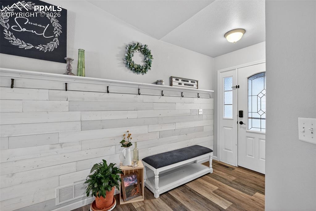 Image 9 of 47: Mudroom with wood finished floors