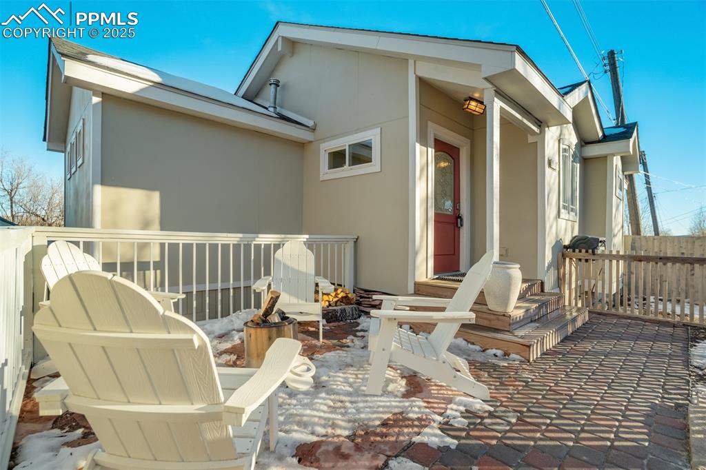 Image 2 of 35: Front patio area that is fully fenced in.