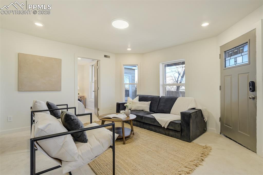 Image 23 of 35: Bedroom is just off the family room in the basement.