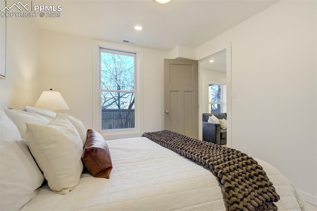 Image 25 of 35: No basement feeling in this space! There is a 4th bedroom in the basement u