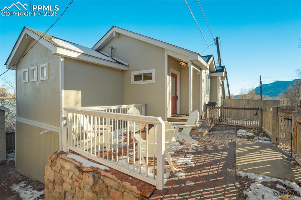 Image 33 of 35: Another look at the front patio where you can watch the sun set over the mo