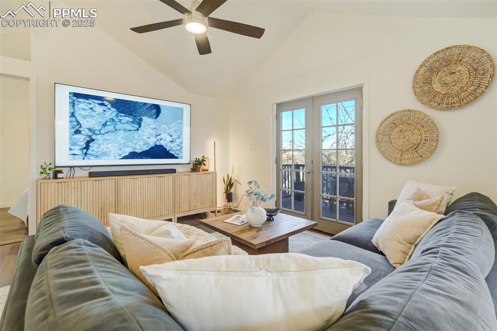 Image 7 of 35: Living room which has a walk-out to the upper deck.