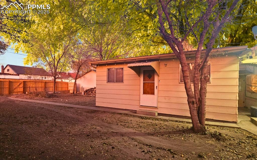 Image 18 of 28: Back House with entrance