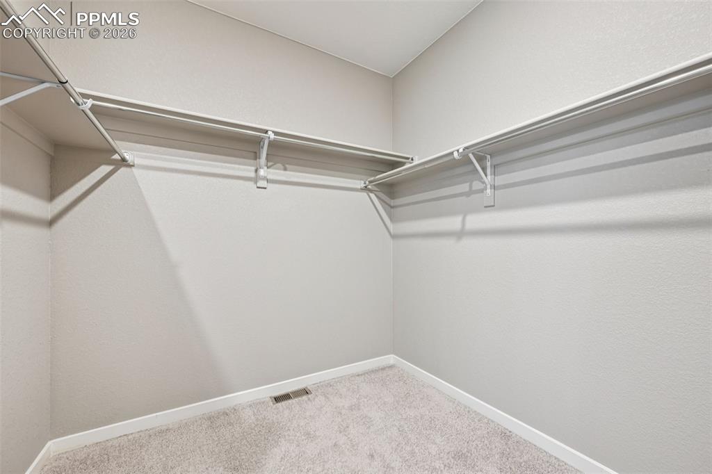 Image 27 of 49: Walk-in Closet