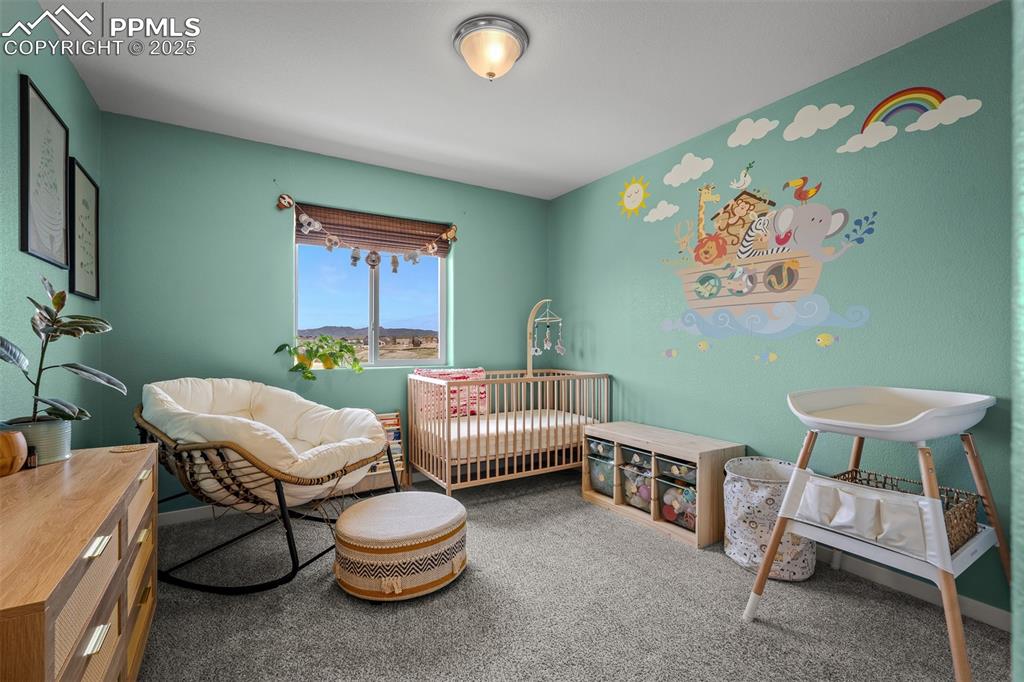 Image 32 of 49: Bedroom featuring carpet floors