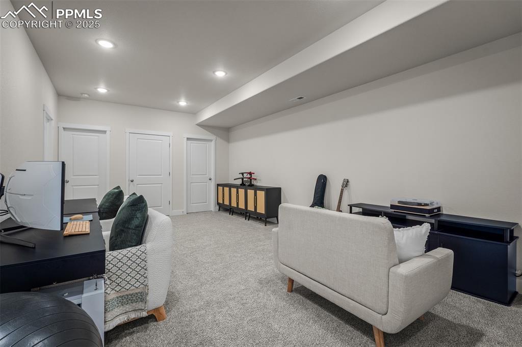 Image 41 of 49: Home office featuring carpet floors, recessed lighting, and baseboards