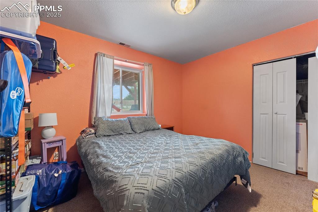 Image 24 of 33: Bedroom